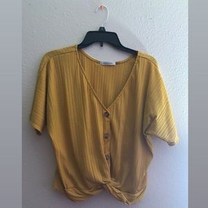 A Mustard Yellow Buttoned Blouse